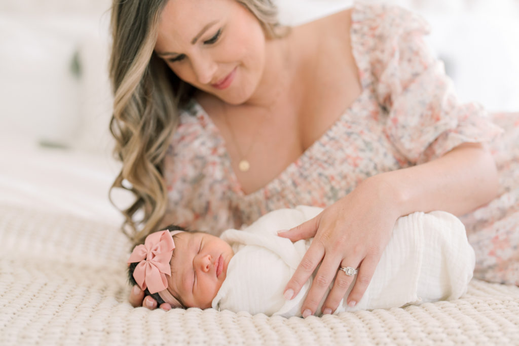 Winston Salem Newborn Photographers Mother and baby during newborn session